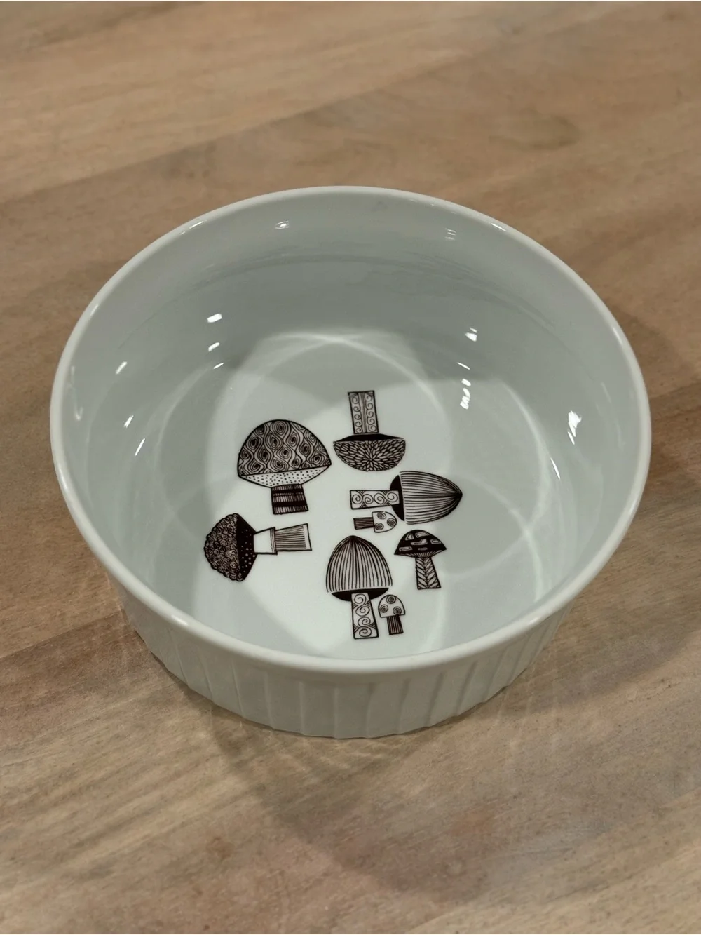 White Ceramic Plate with Small Decorative Sticker